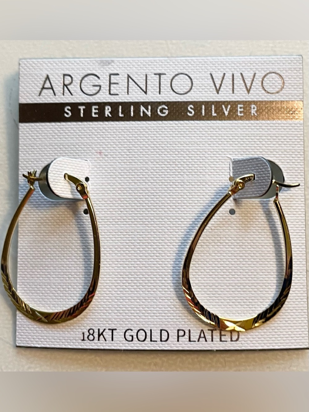 Brand new Gold Teardrop Hoop Earrings
